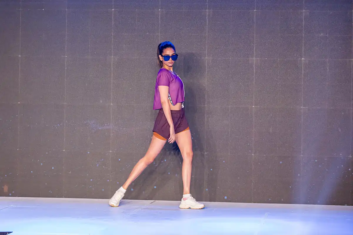 RECYCLO Fashion Show purple dress girl image
